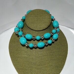 Women`s silver tone blue bead large necklace.